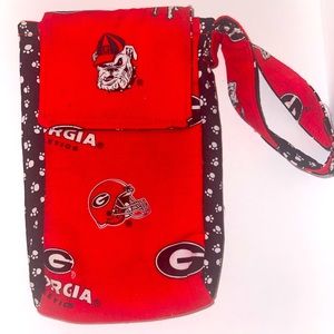 Georgia Bulldog wristlet, worn a few times, and good for personal items in!!!